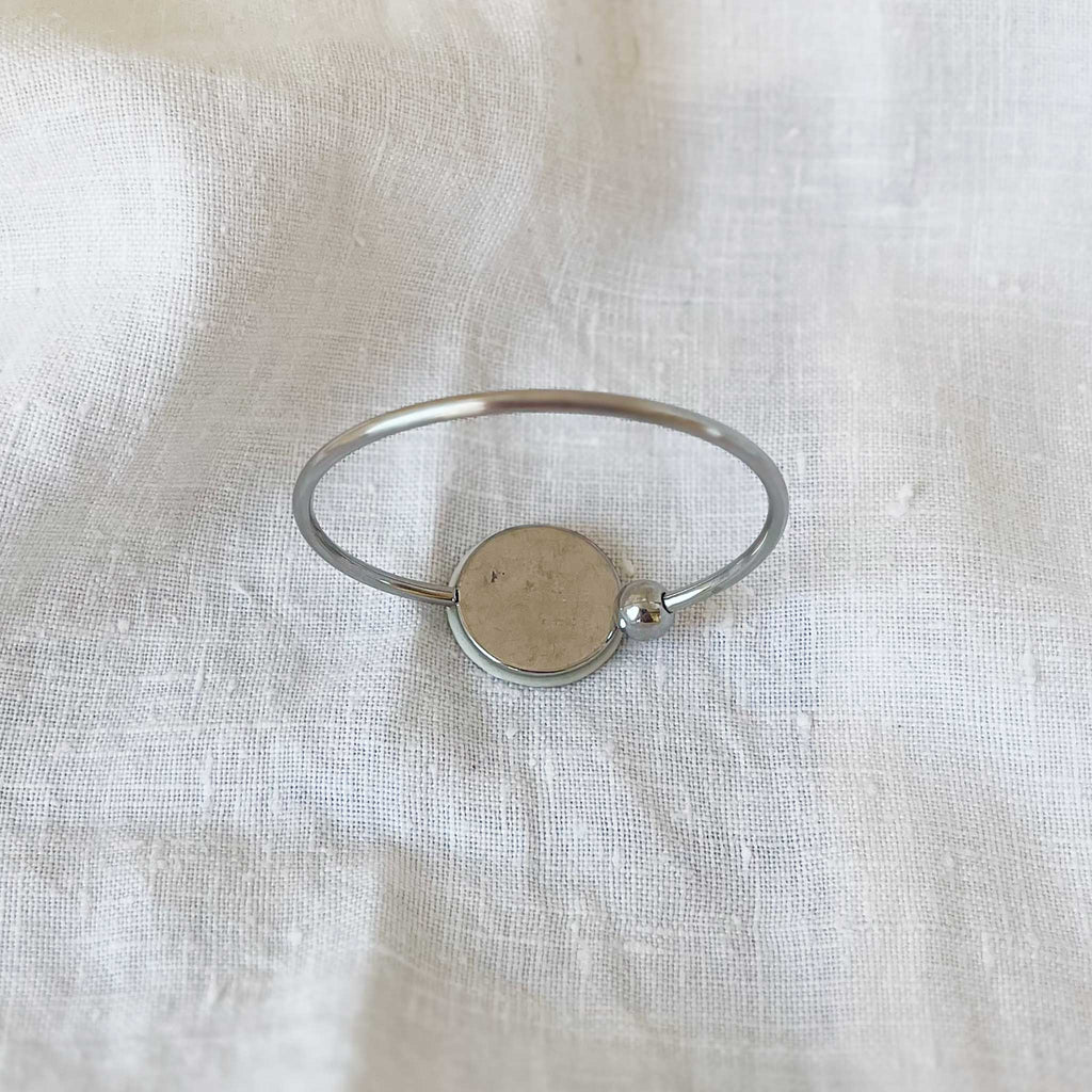 Pulsera rígida y flexible realizada en porcelana china miniatura y acero inoxidable