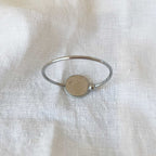 Pulsera rígida y flexible realizada en porcelana china miniatura y acero inoxidable